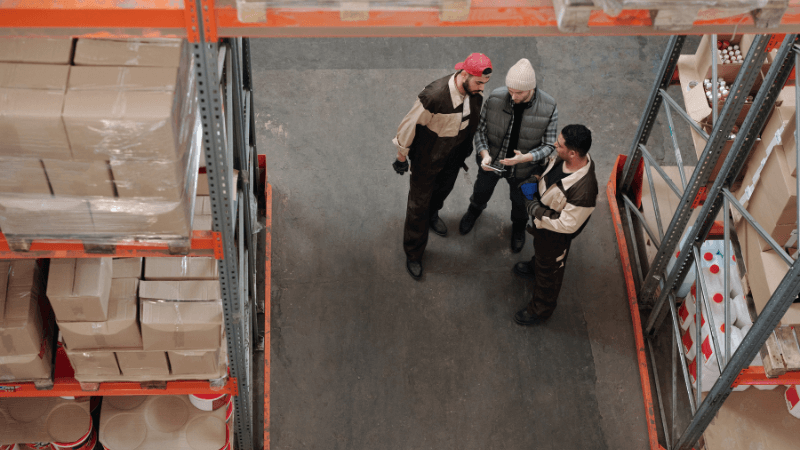 warehouse workers and management