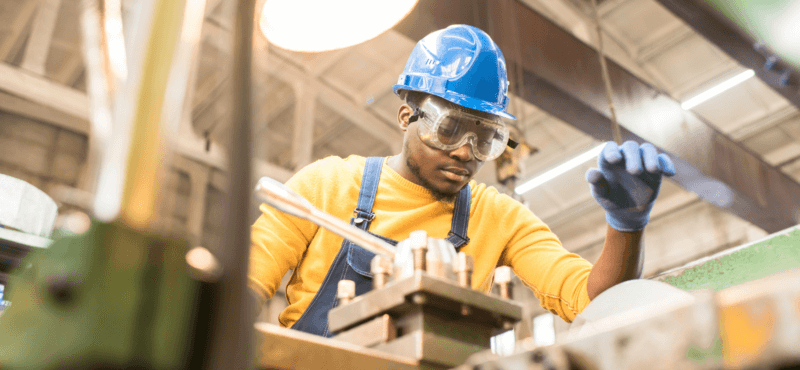 Employee engagement manufacturing frontline worker operating machinery